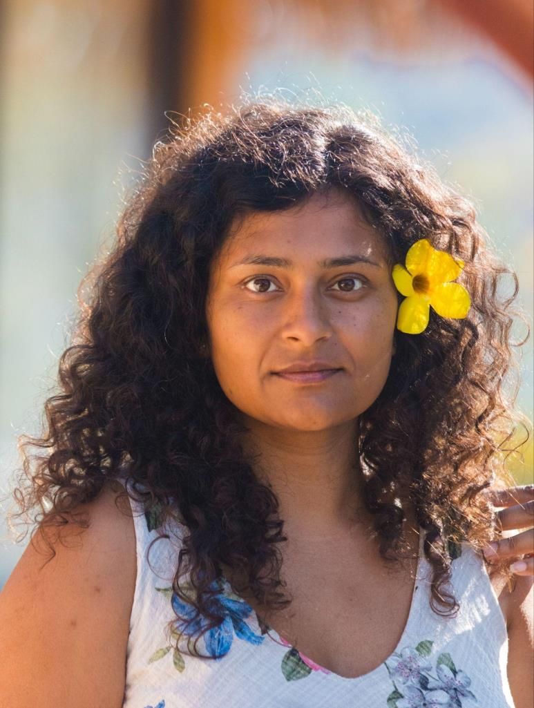 Portrait of Okha Butler, founder of The Heart Center and advocate for trauma-informed healing